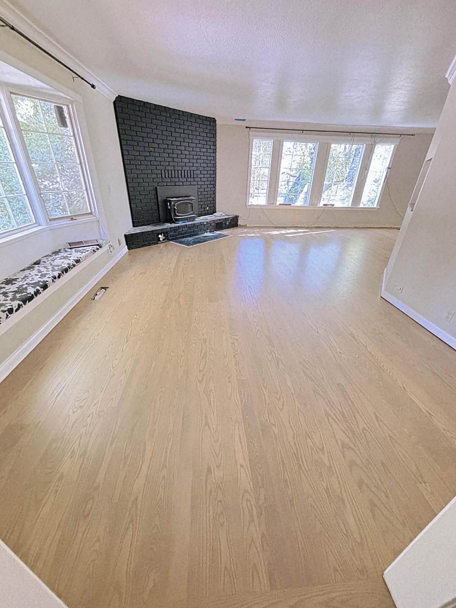 Same floor refinished with sand dune and white stain